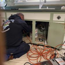 Kitchen-sink-backed-up-cleared-with-mini-jetter 1